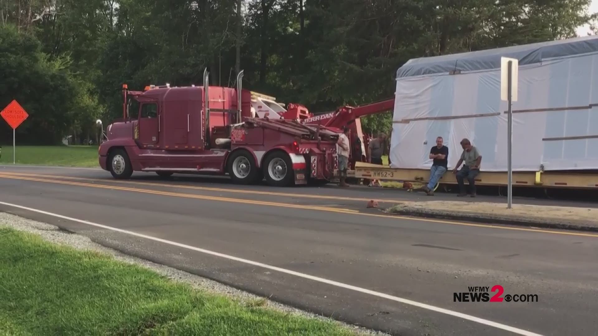 A mobile home fell off of a tractor-trailer truck at the same intersection of a logging crash last week in Haw River