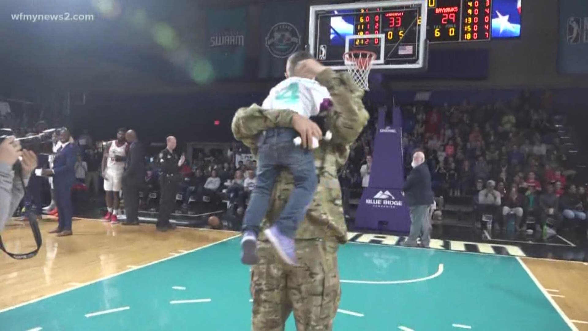 A local dad surprised his family at the Greensboro swarm GAME TODAY