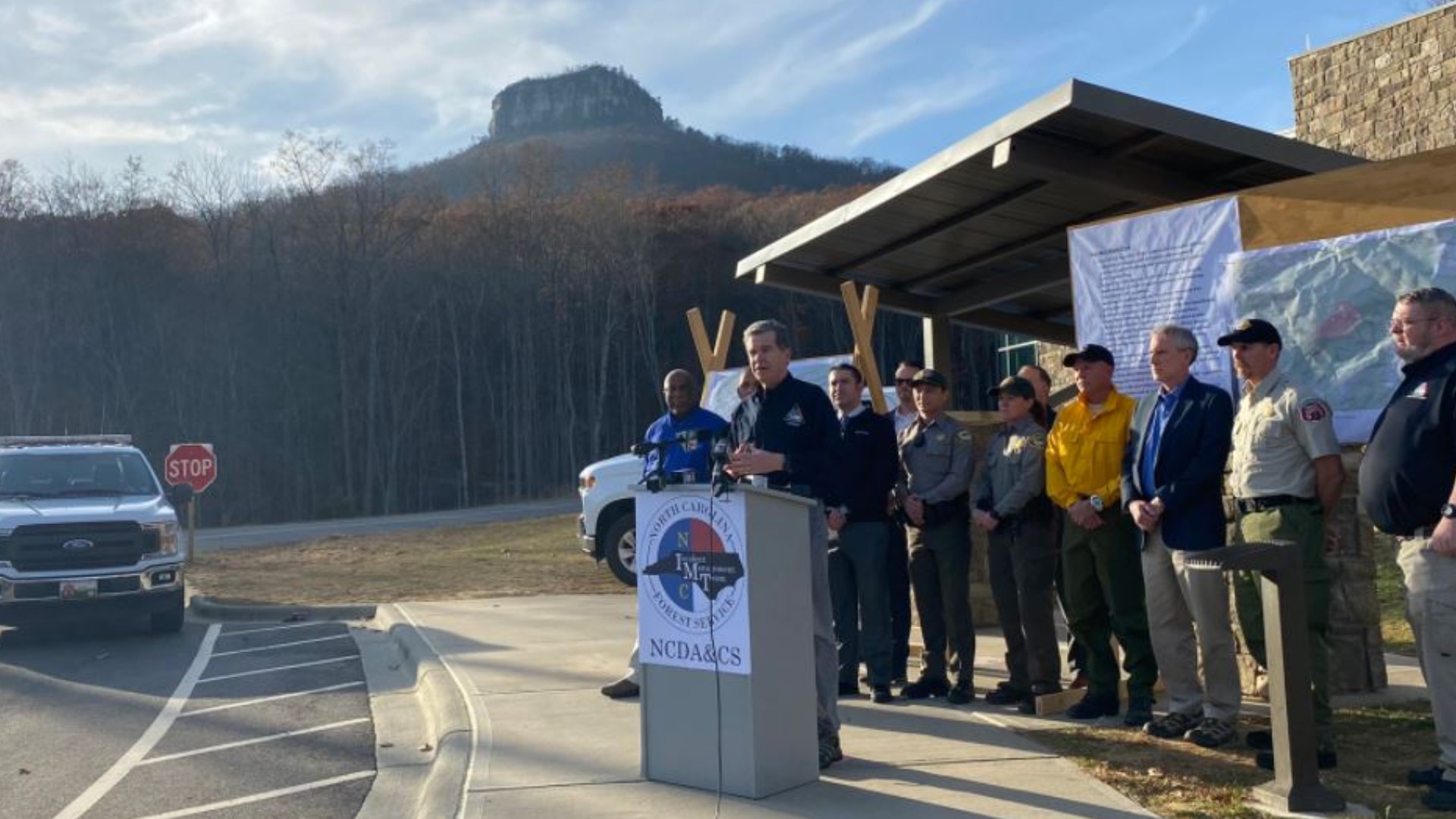 Gov. Roy Cooper said, "We can bounce back from this," while talking about the wildfire damage at Pilot Mountain.