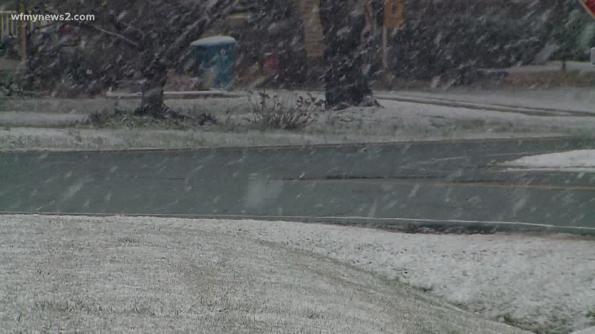 Big flakes fell Friday afternoon. Officials warned roads could be slick heading into the morning.