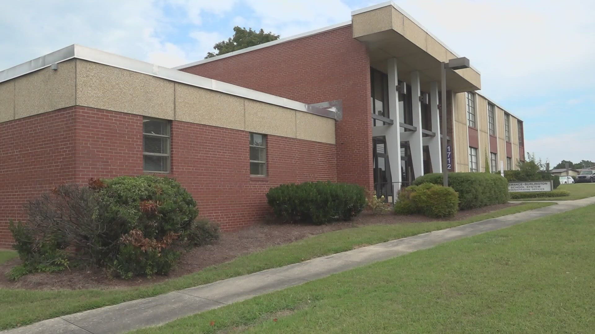 Alamance Burlington School System may lay-off workers due to money problems.