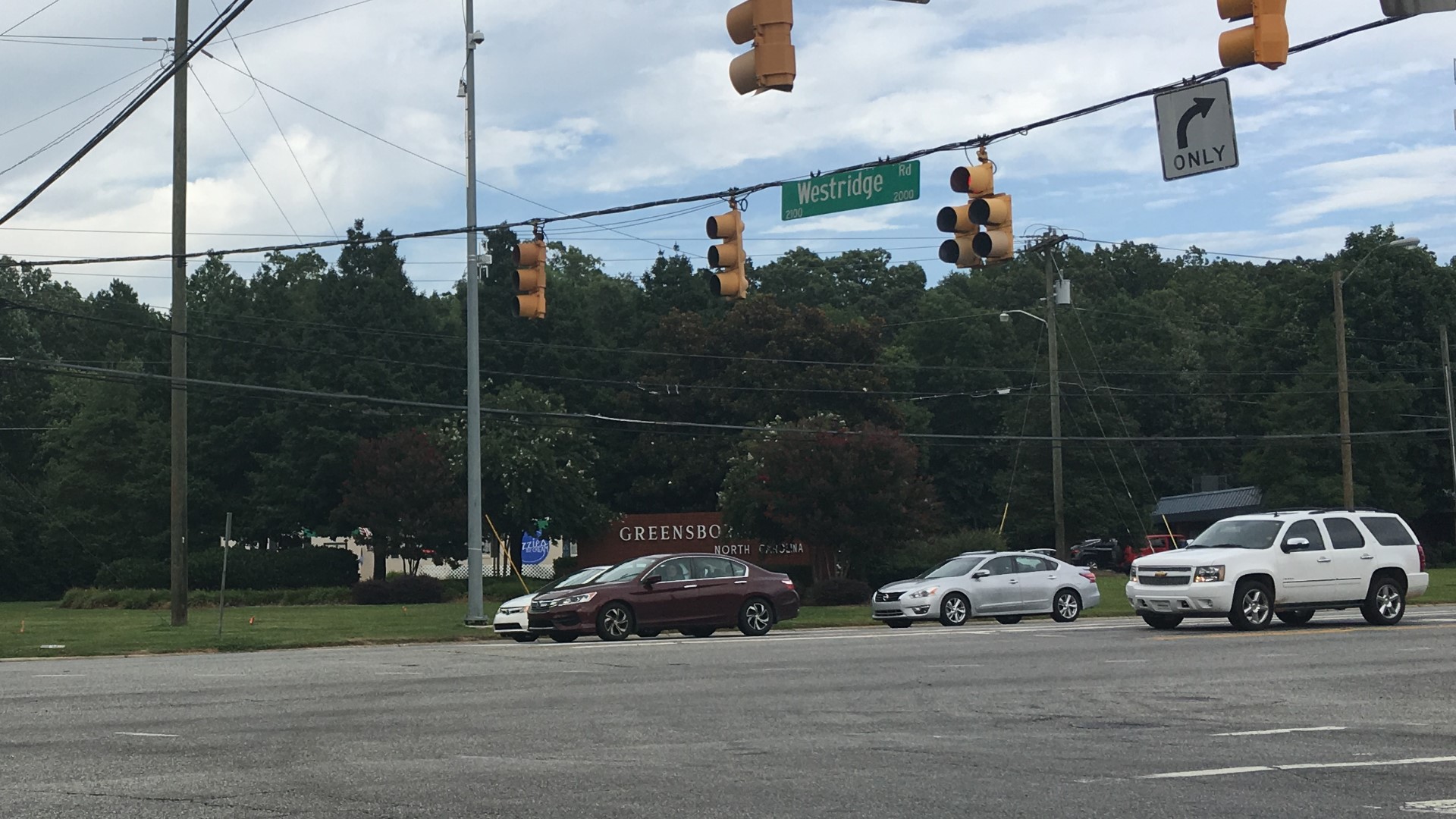 The City of Greensboro says Battleground Avenue will be widened to make room for more lanes, sidewalks and another traffic light at the Westridge Shopping Center.