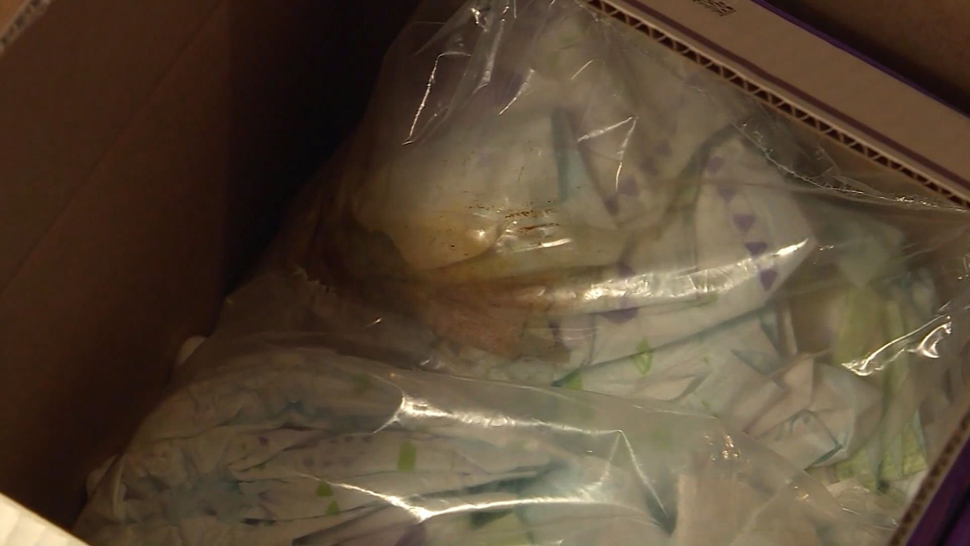 The customer ordered diapers and opened the package to find dirty diapers. The child has a compromised immune system. Video: CBS Newspath