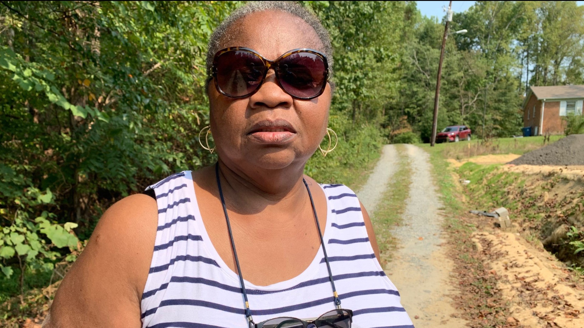 Ava Moore uses her driveway at least three to four times a day. So, when a good part of it is flooded or covered in mud, it makes harder getting to and from home.