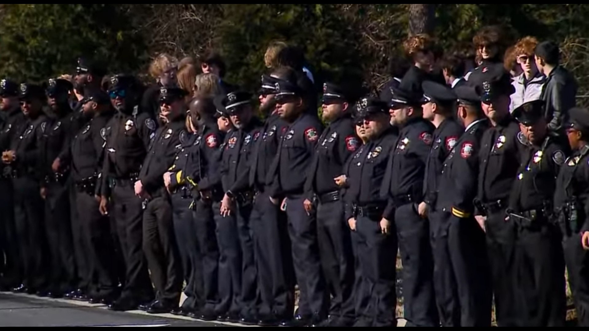 Hundreds of law enforcement await Sgt. Philip Dale Nix's arrival at the church.