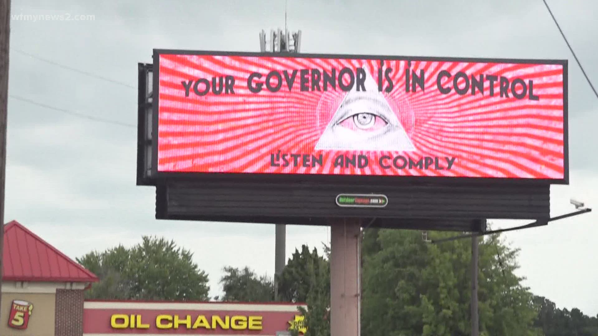Marty Kotis put up a billboard saying things like "Follow the Order" and "Your Governor is in Control".