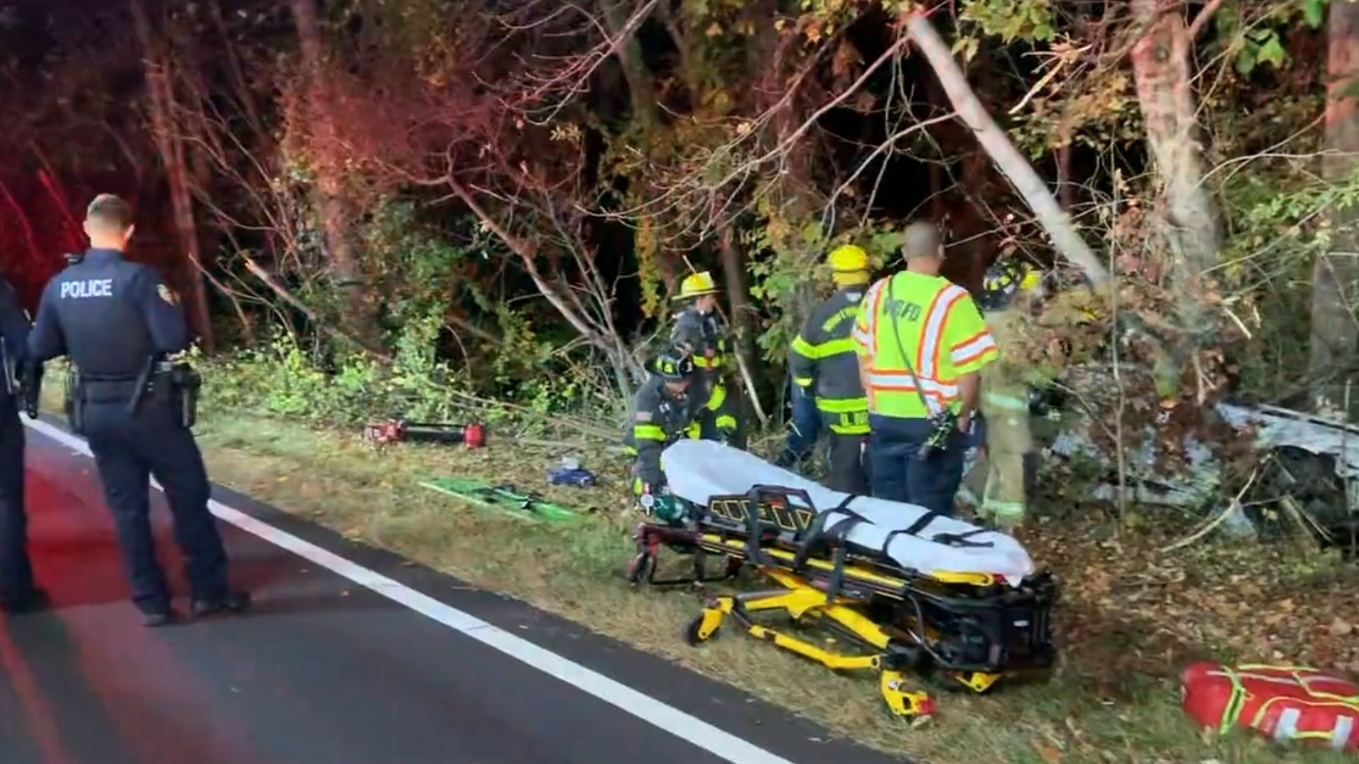 A road is closed after fire officials said a person got stuck inside a vehicle near Peace Haven Road in Winston-Salem.