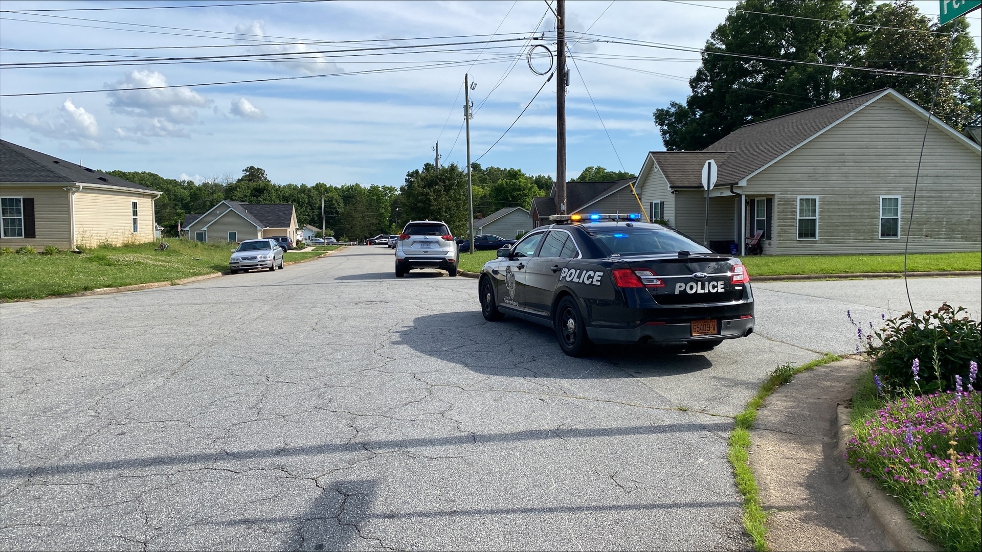 There is a large police presence on Denny Road near Derby Place.