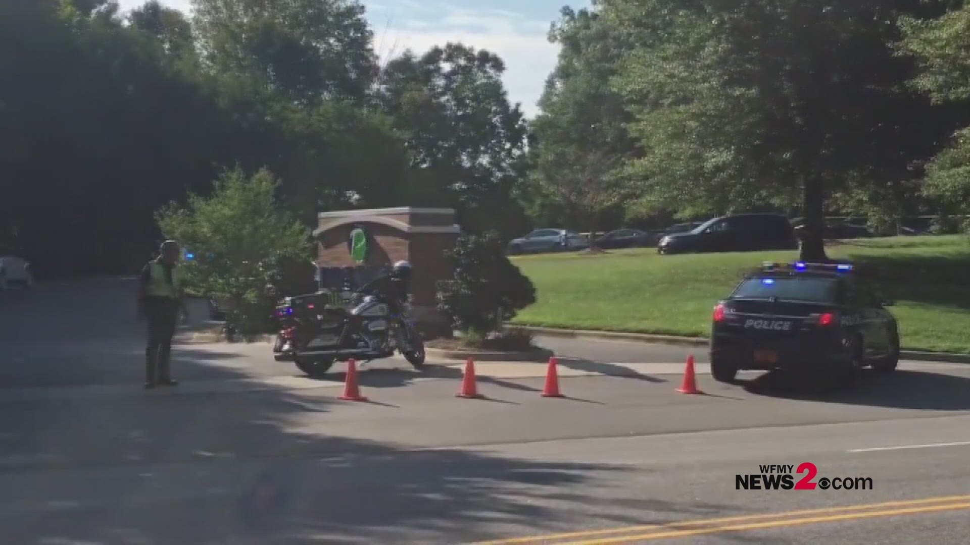 Police are investigating a domestic-related shooting at a Credit Union on Yanceyville Street. Police say a woman died, and a man was taken to the hospital with injuries.