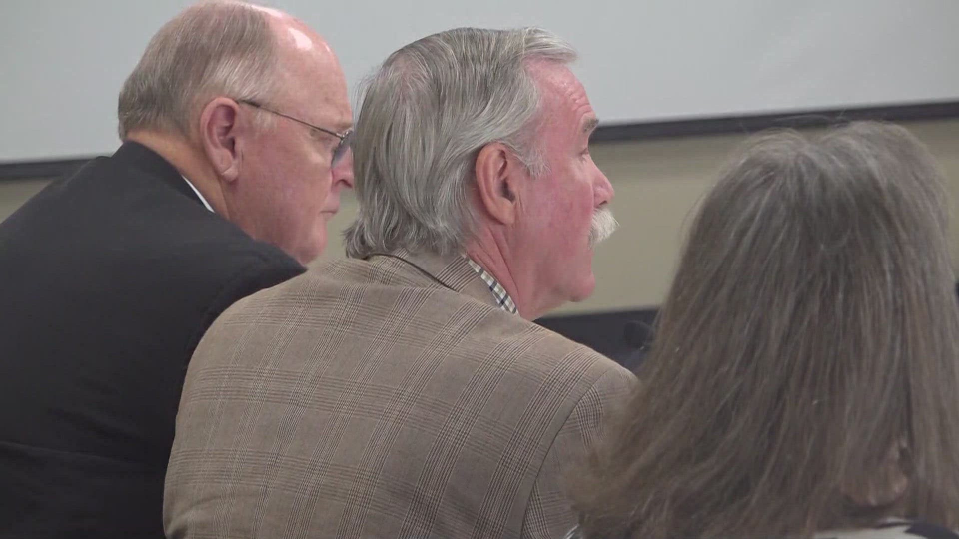 Alamance County commissioners meet with state leaders about job cuts after money troubles.