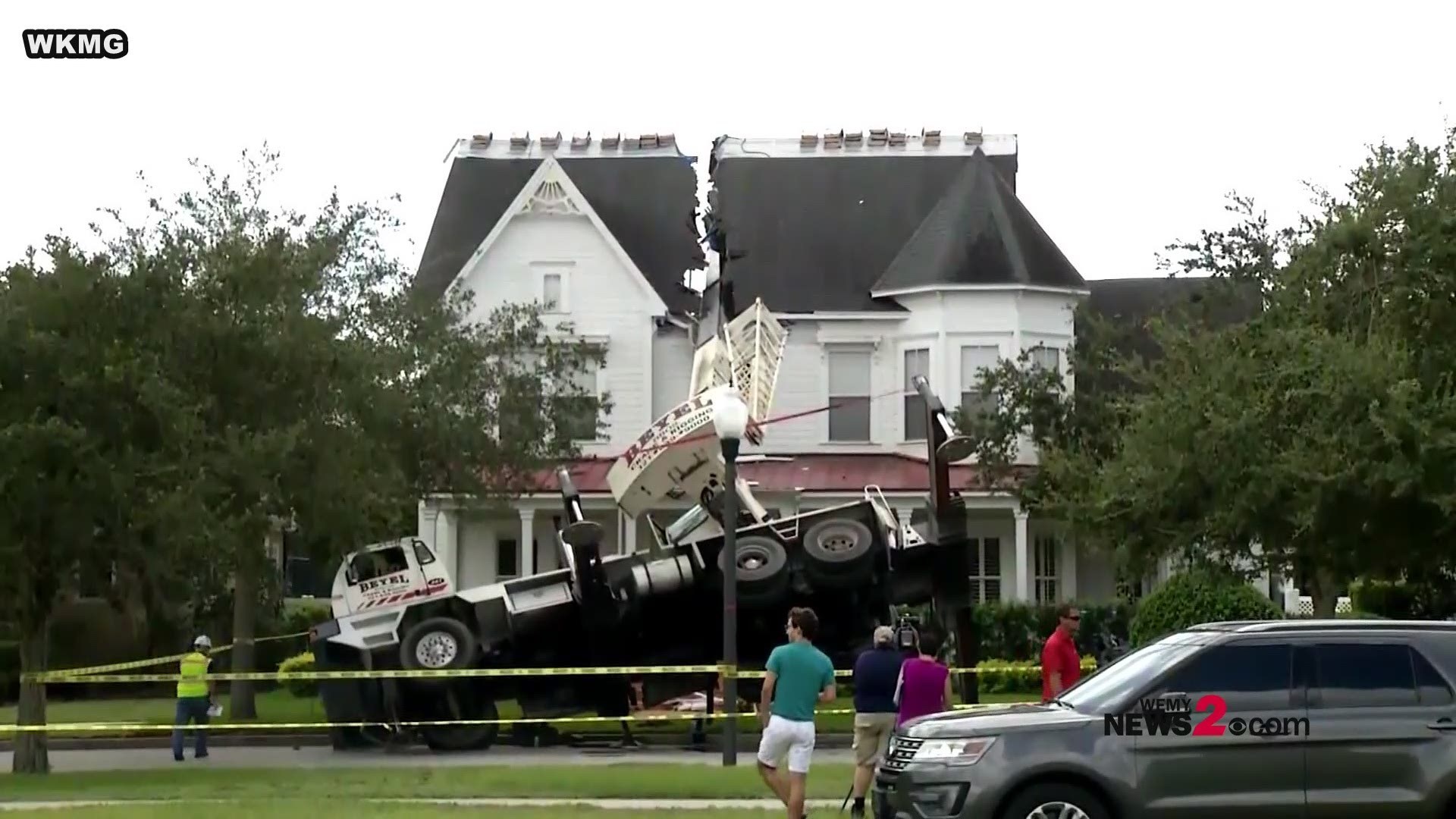 A construction crane fell onto a house in Orlando splitting it in half.