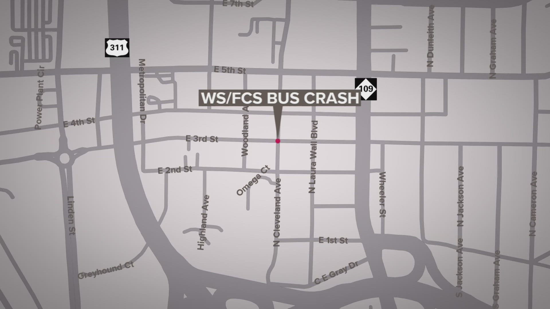 Police have charged a driver for crashing into a bus.