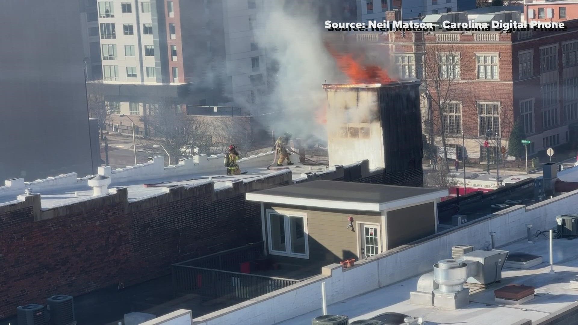 Firefighters worked to get a building fire under control in downtown Greensboro Friday morning.