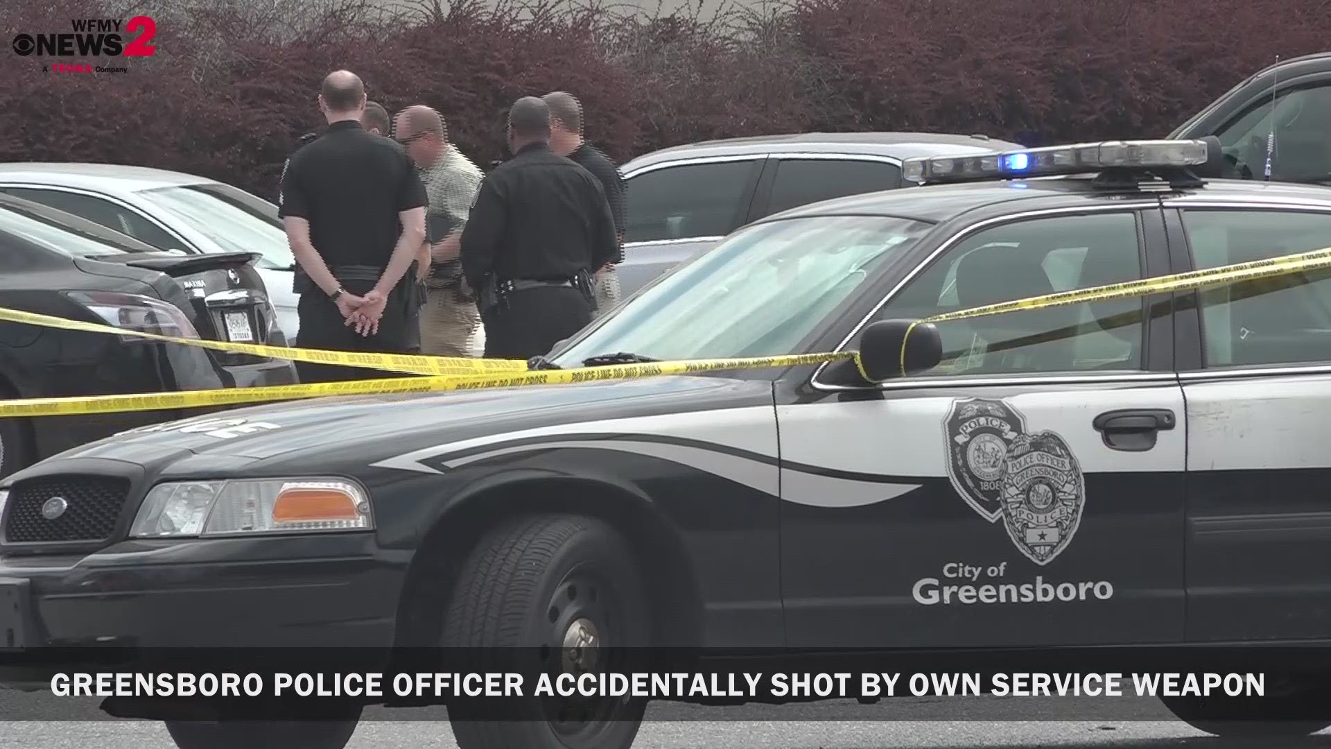 Greensboro police are investigating after an officer was shot in the abdomen by his own department issued gun.