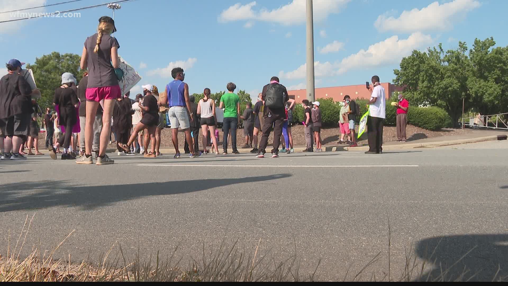 More than 100 protesters marched down University Parkway. They started in front of LJVM Coliseum and moved down to Reynolda Road.