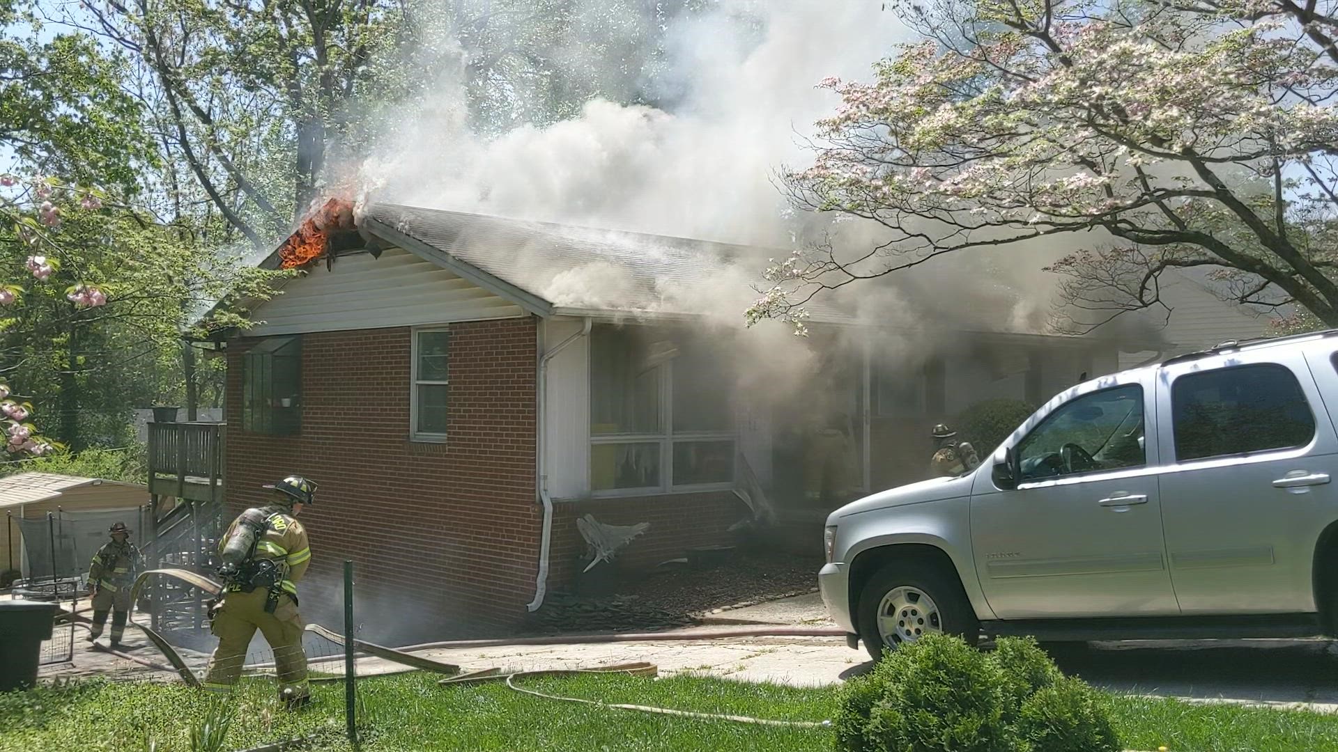 Greensboro firefighters are at the scene of a house fire on Markland Drive near Battleground Avenue Wednesday afternoon.