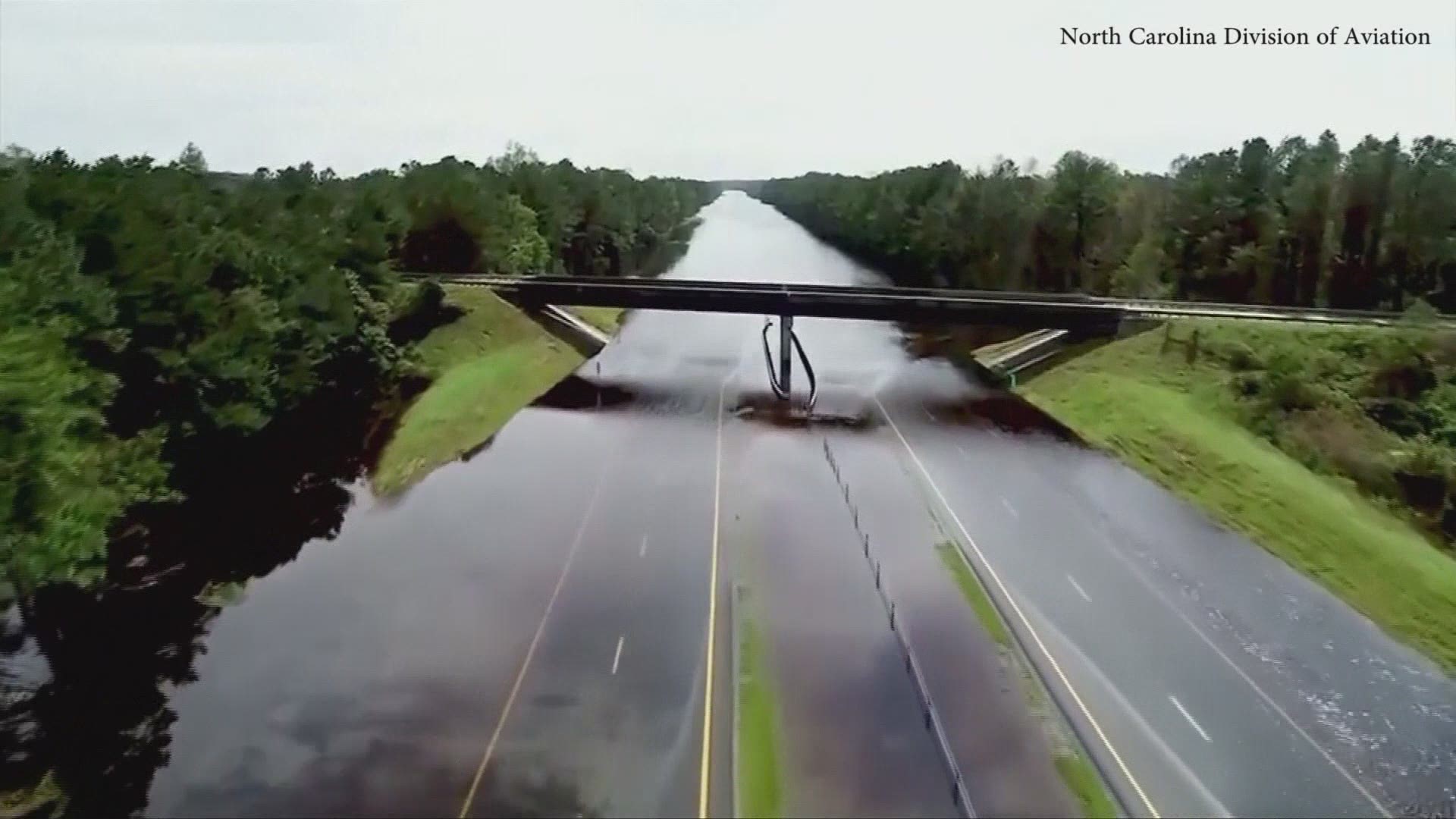 Drone flies over a flooded I-40 in Pender County, NC