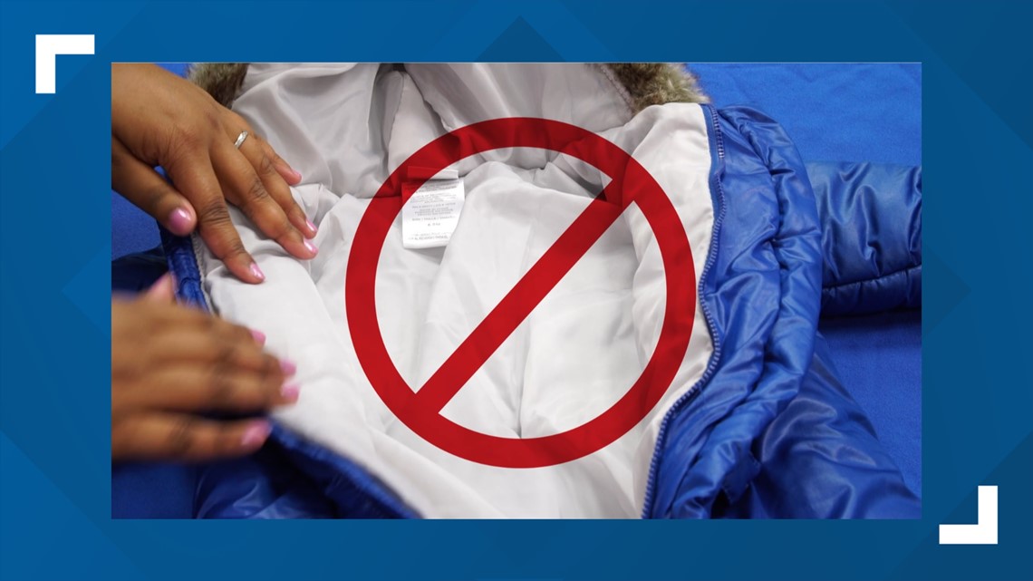 Can my child wear a coat in a car seat?