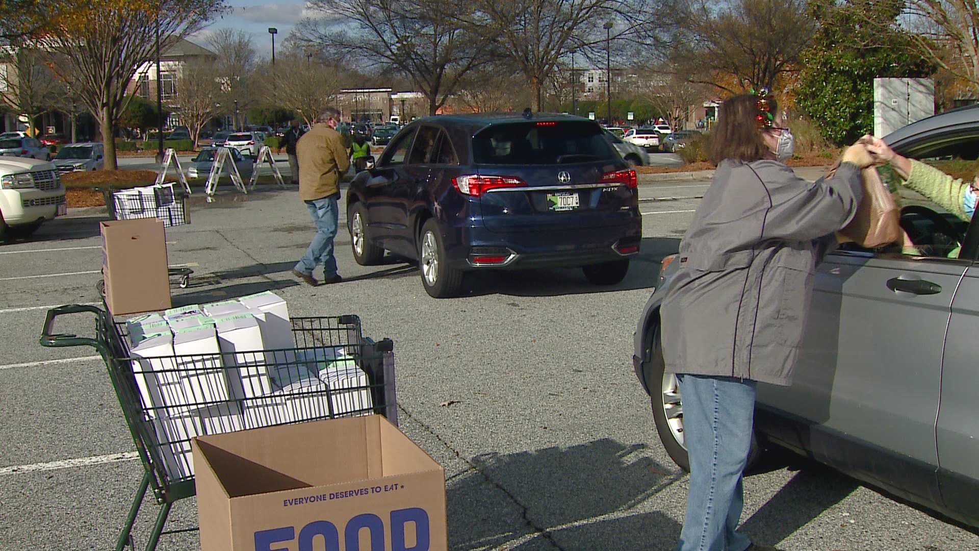 WFMY News 2 partnered with Friendly Center and Second Harvest Food Bank Saturday for the 'Waving Santa Donation Drive-thru' event!