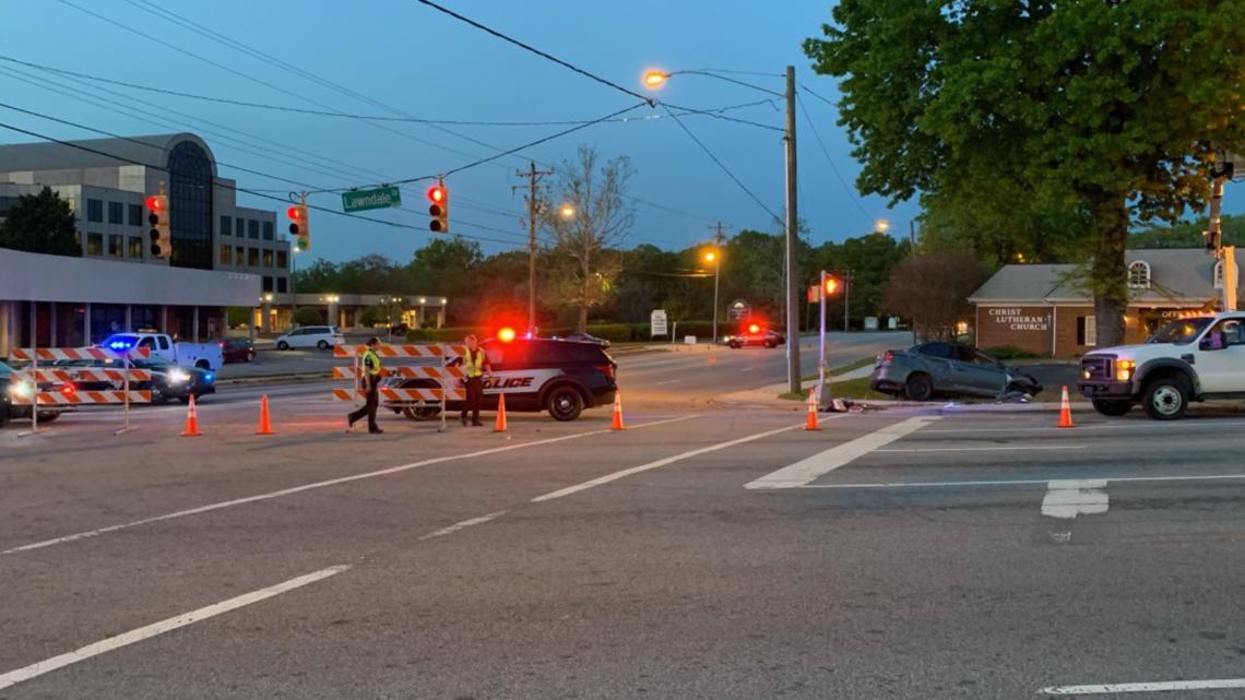 Powerlines down after wreck on Lawndale Drive at Pisgah Church Road in