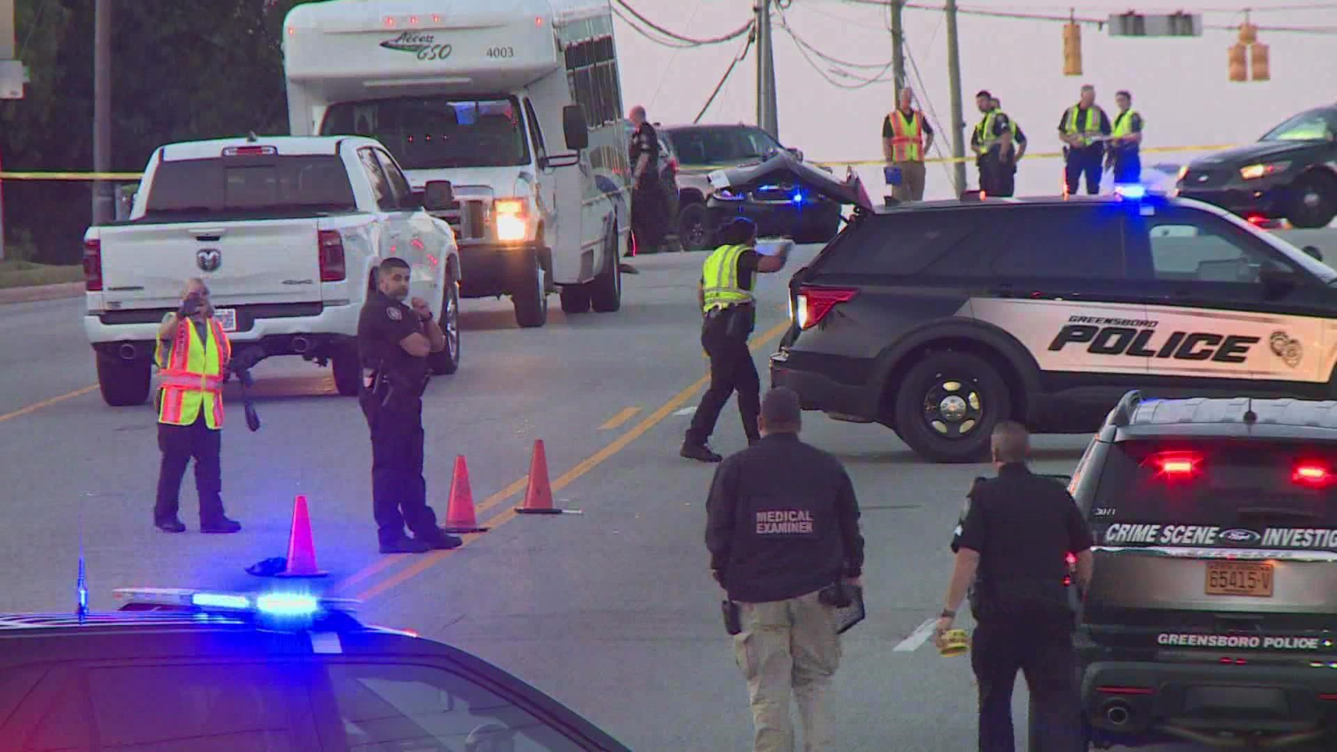 Greensboro police say 71-year-old John Rankin died after getting hit by two trucks.