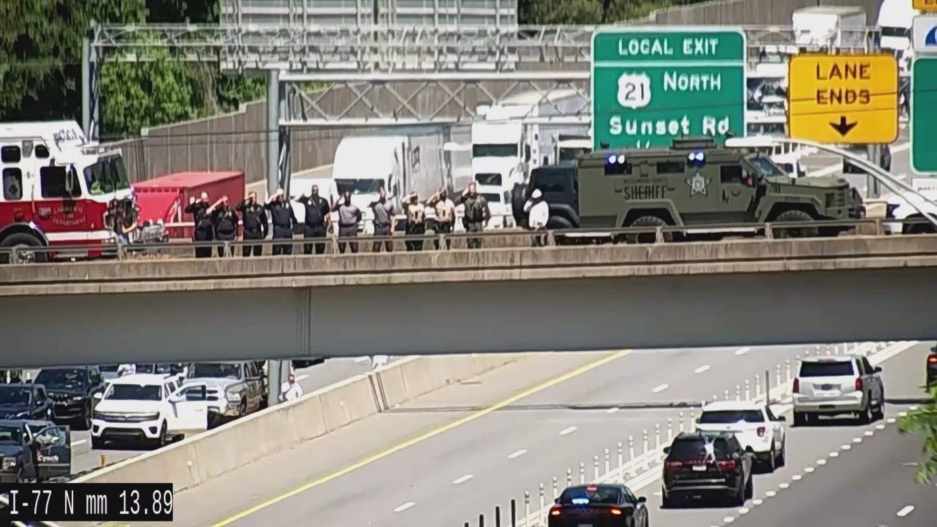 Video shows a long procession Wednesday as law enforcement transported Deputy Marshal Thomas Weeks.