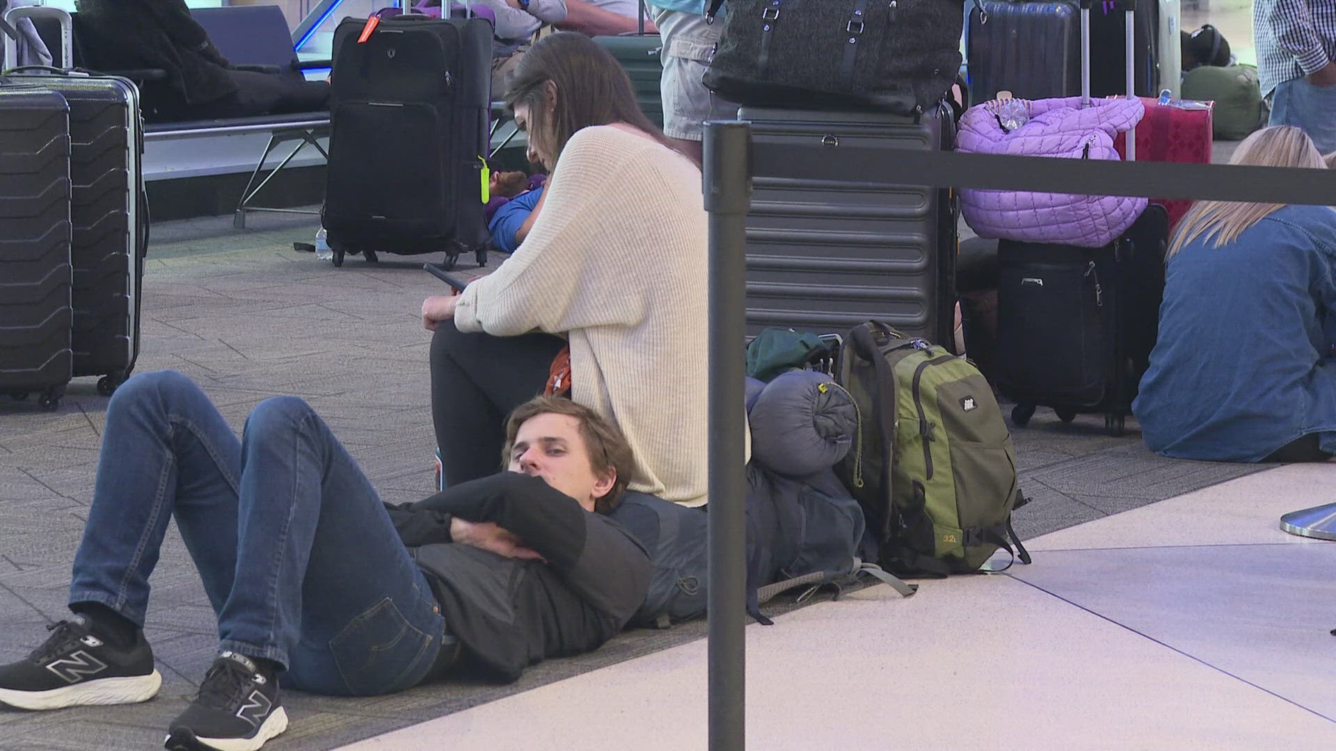 Passengers stay positive despite flight delays and cancelations.