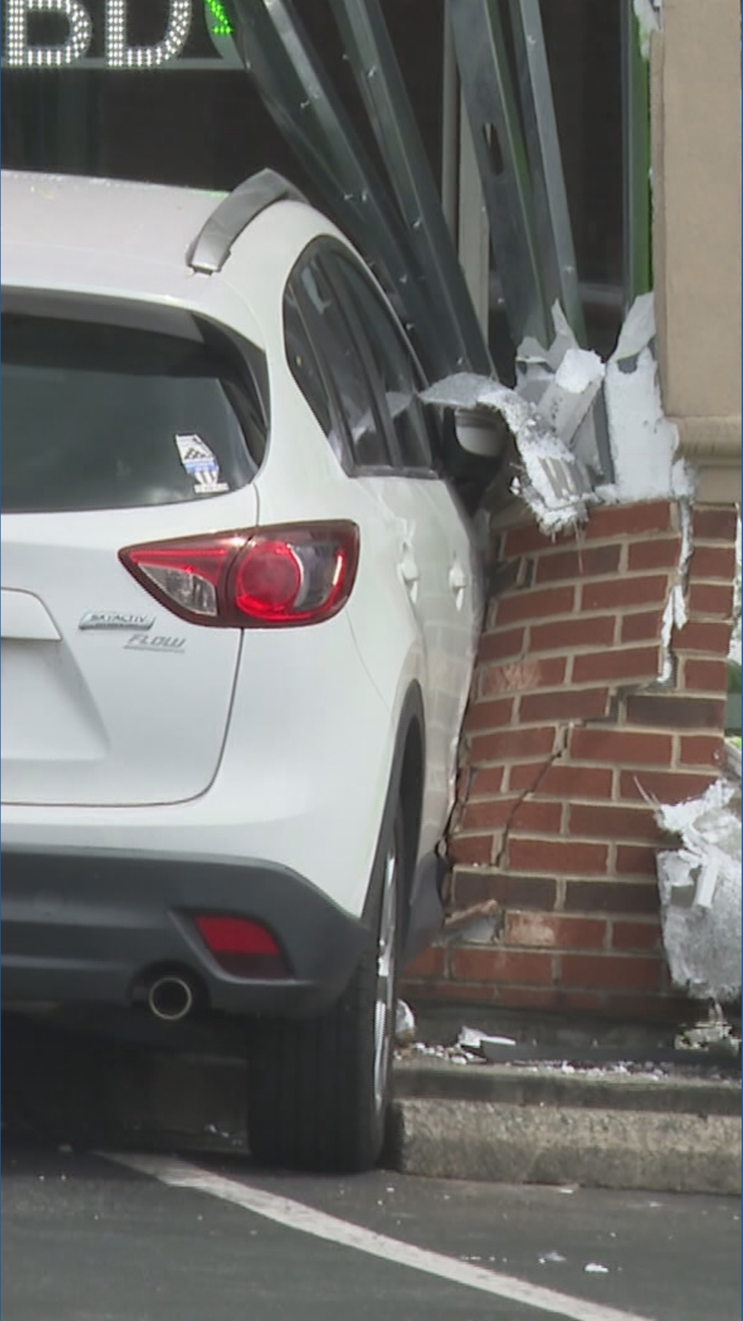 Car crashes into building on Battleground Avenue | wfmynews2.com