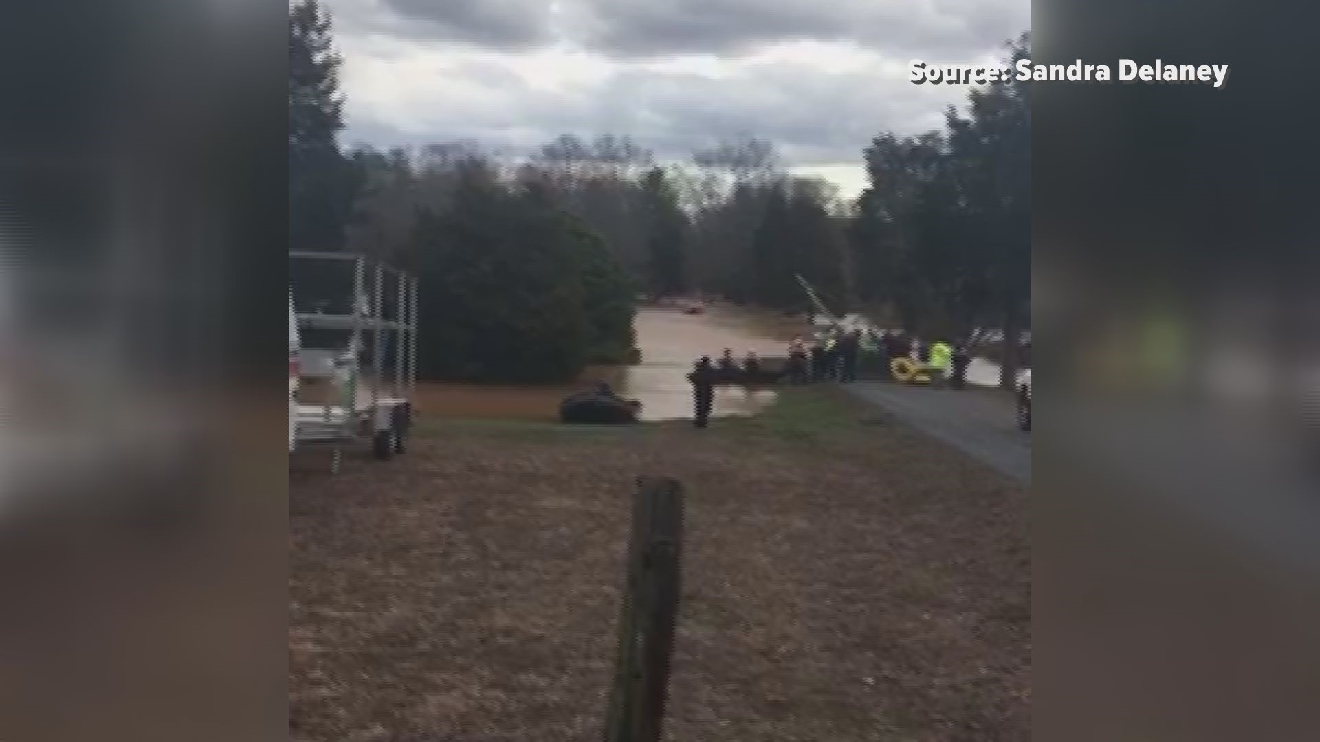 Rescue crews used boats to get to eight campers surrounded by floodwaters at the Dan River Campground.