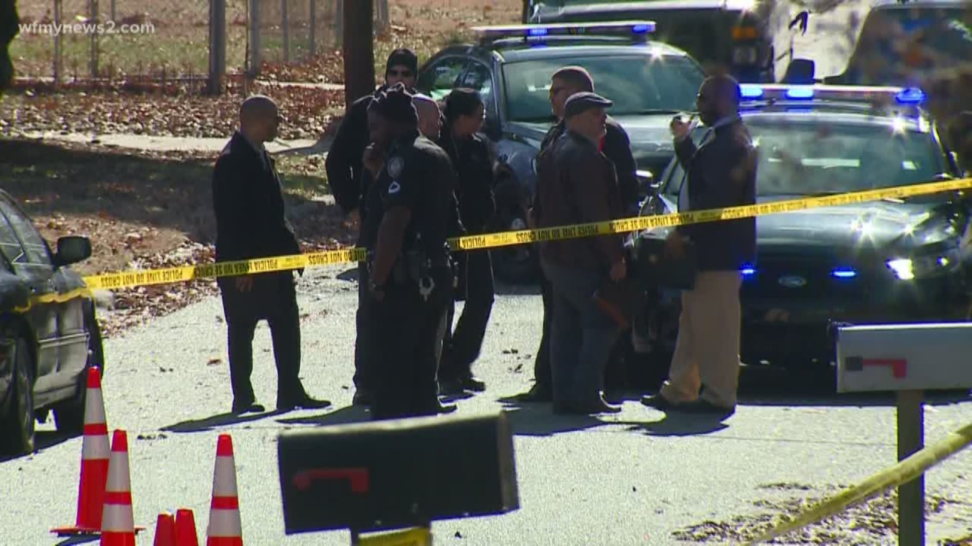 Greensboro police say witnesses told them the suspect was driving a dark car.