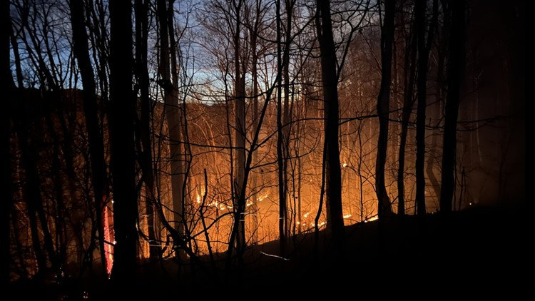 Wildfire continues to burn following rain near Asheville