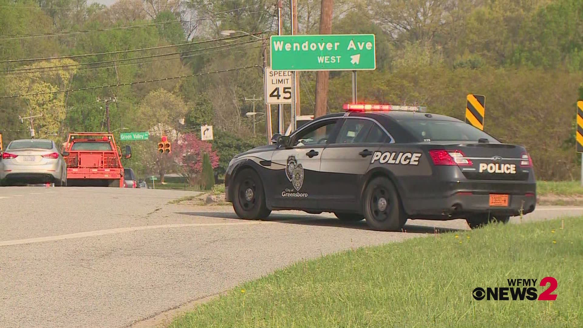 West Wendover Avenue is closed between Westover Terrace and Benjamin Parkway in Greensboro after a crash.