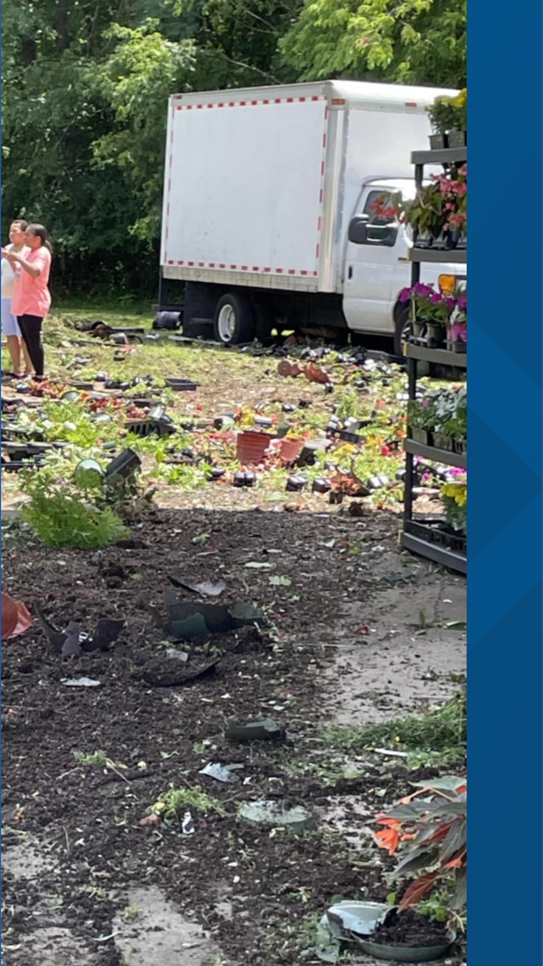Eden family cleaning up after car plows into their produce stand ...