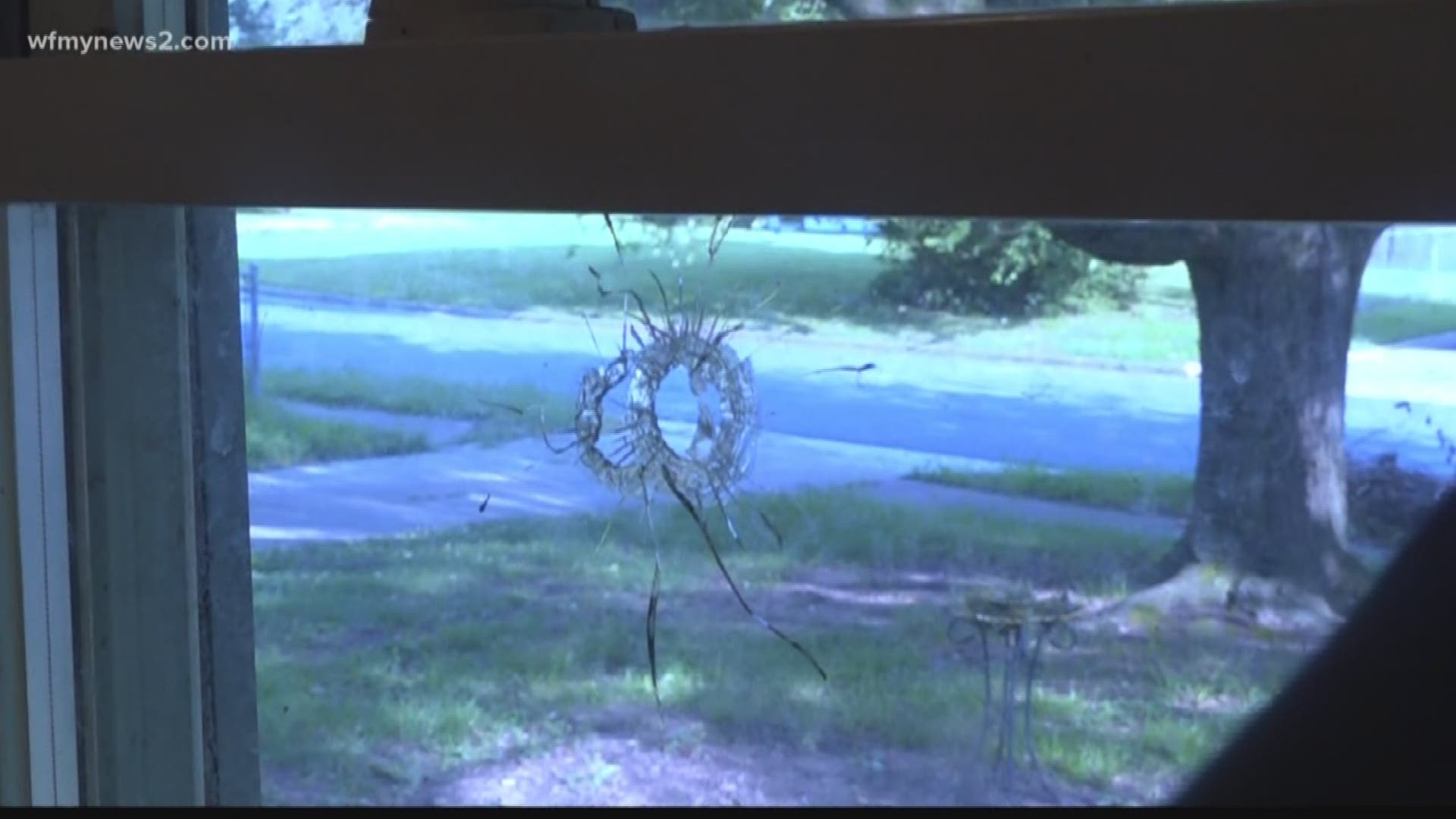 Bullets went through windows, walls and a pillow, Greensboro police said.