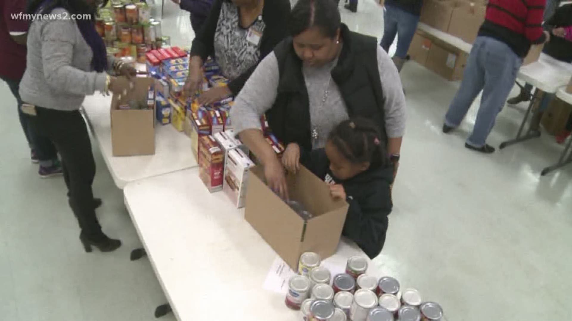 Volunteers packed up thousands of boxes with food for families in need this Thanksgiving.