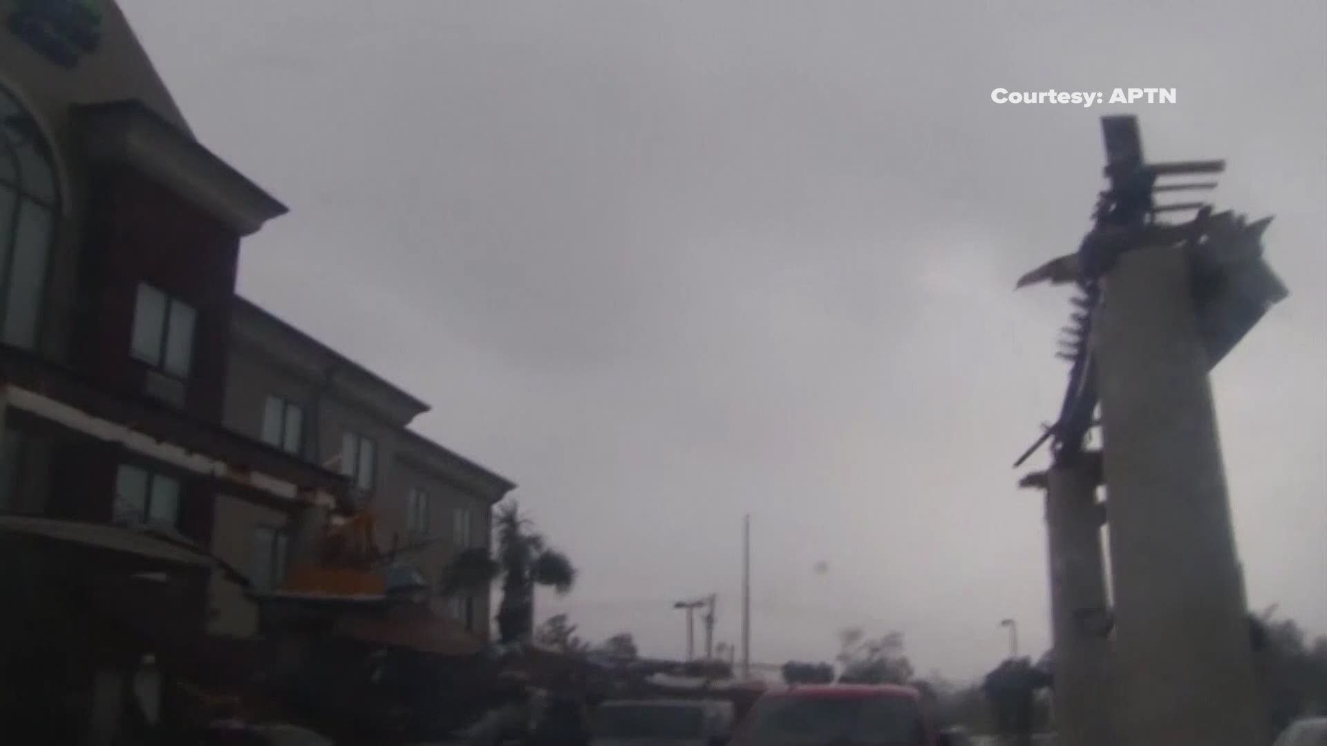 Hurricane Michael made landfall in Panama City, Florida on Wednesday ripping off the canopy roof of a hotel and destroying nearby cars, signs and building fixtures.