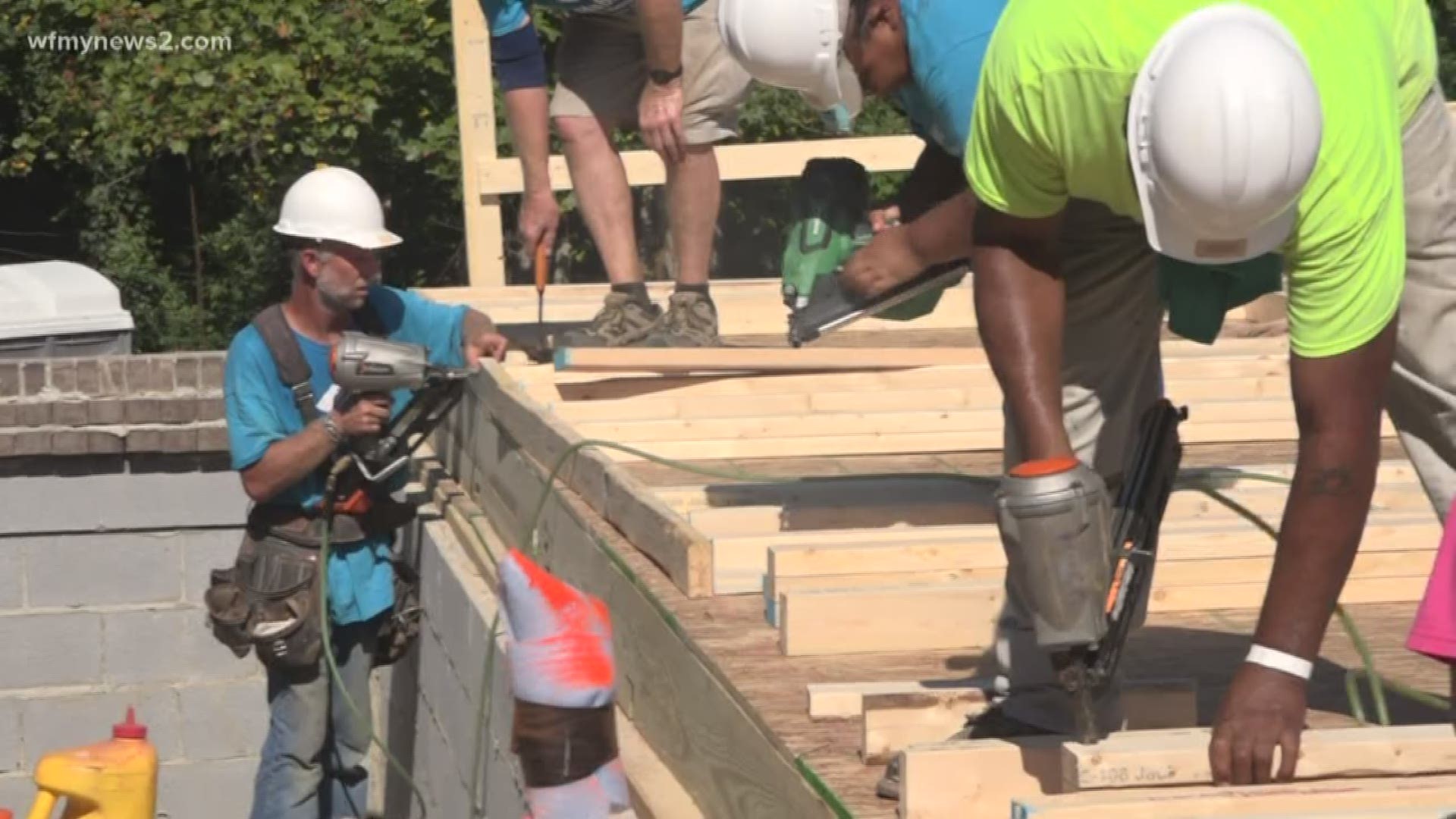 Volunteers and community leaders helped rebuild the home