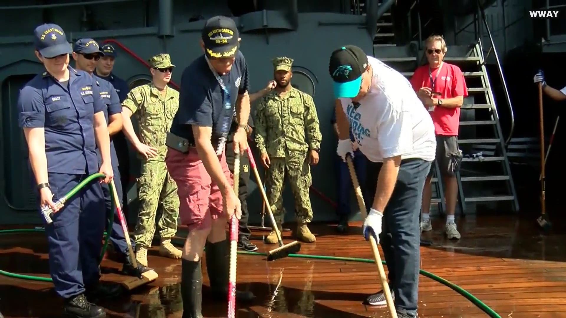 "Keep Pounding Day' kicked-off as Panthers' Owner David Tepper boarded the Battleship North Carolina to lend a helping hand. He volunteered to scrub the decks of the battleship.