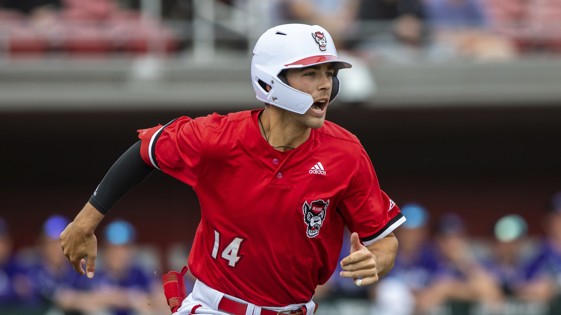 North Carolina State's Jacob Cozart  runs to first base during an NCAA baseball game in Raleigh, N.C. (Ben McKeown)