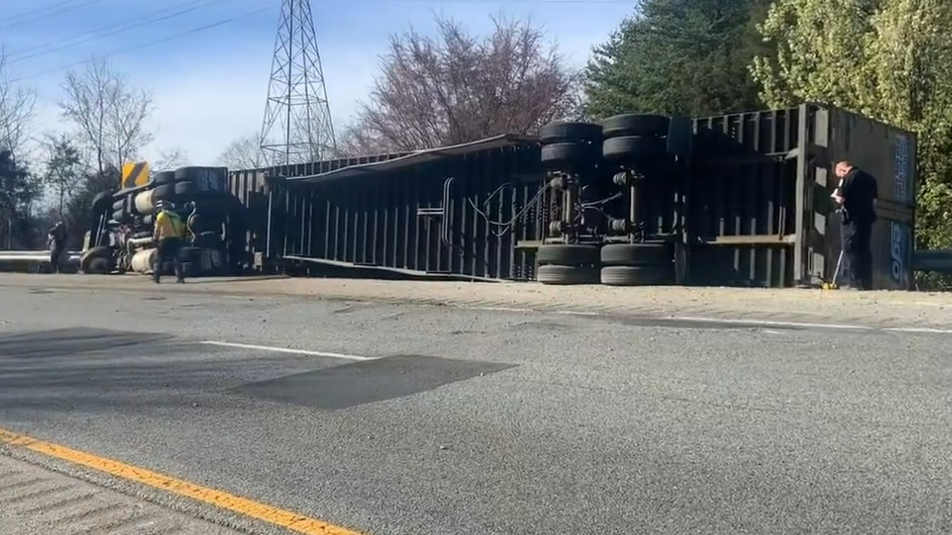 Emergency crews are on the scene of an overturned tractor-trailer on I-40 W near 311 N. Fire officials said to expect extended delays.