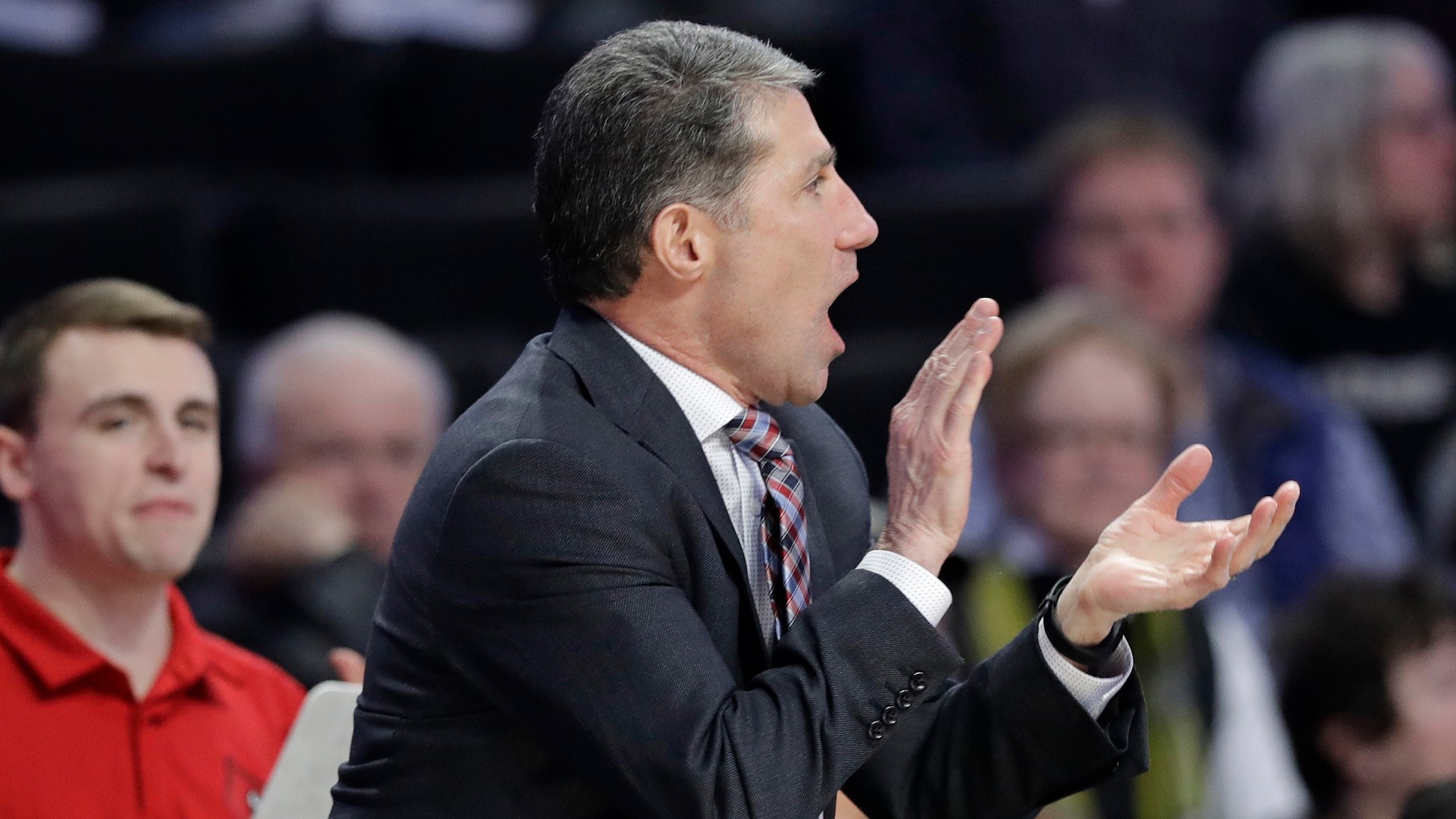 Dino Gaudio allegedly threatened to report to the media allegations that the men's basketball program had violated NCAA rules in its recruiting videos.