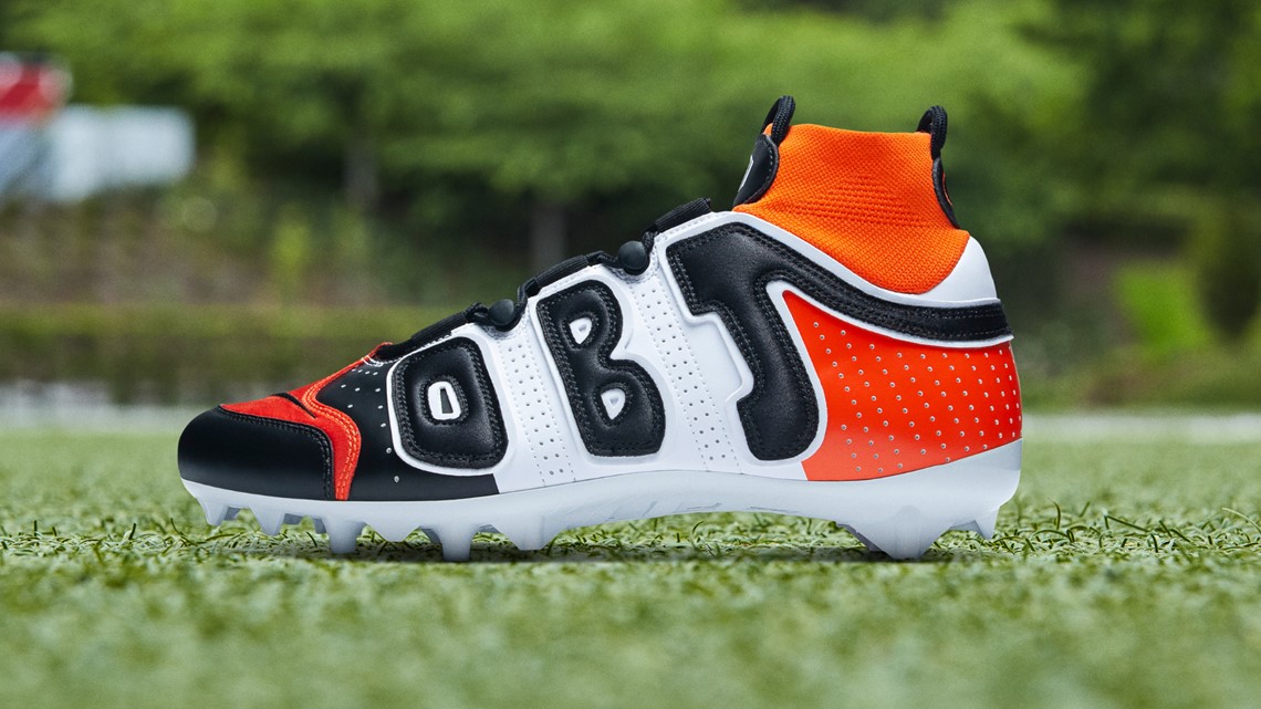 orange jordan cleats