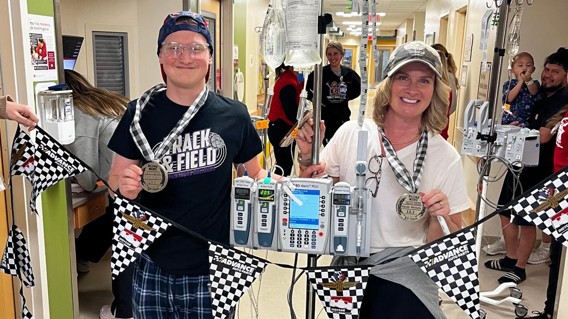 Indiana boy battling cancer completes Mini-Marathon in hospital hallways