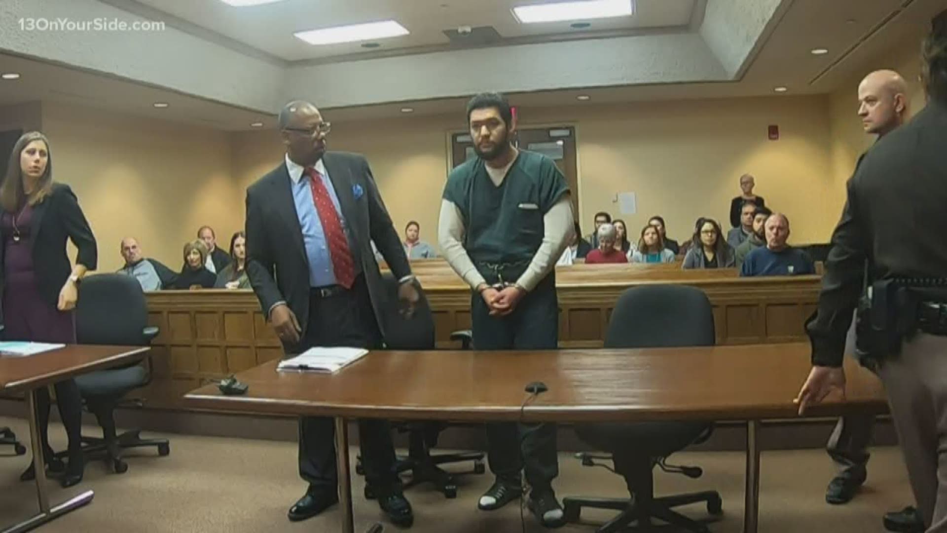 Eric Anthony Alvarez, who is accused of a road-rage ‘body-slam’ in a Walker business parking lot, was trying to avoid a confrontation, his lawyer says.